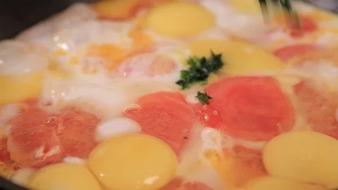 Eggs with tomatoes Stock Footage 100989633