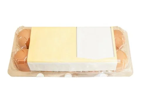 Eggs in transparent plastic box Stock Photos