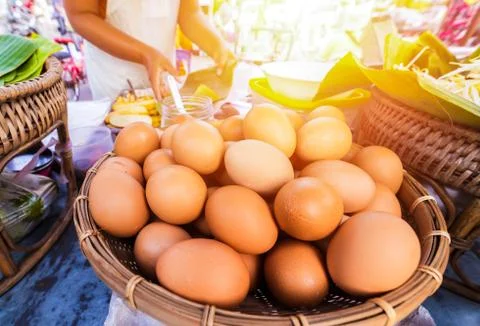 Eggs on tray and chef make food. Stock Photos
