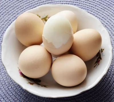 Eggs with whisk Stock Photos