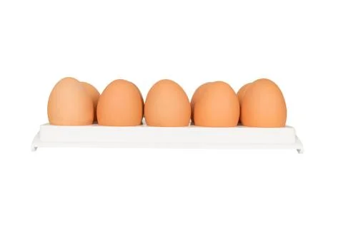 Eggs in white container Stock Photos