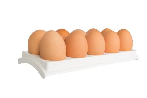 Eggs in white container Foto stock