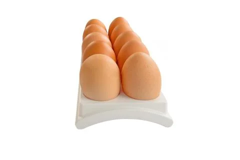 Eggs in white container Stock Photos