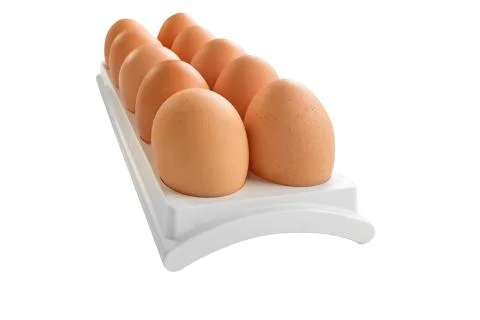 Eggs in white container Stock Photos
