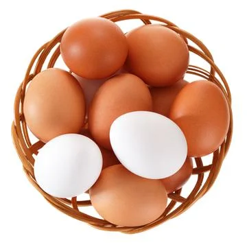Eggs in a wicker basket. View from above. Isolated on white background. Stock-Fotos