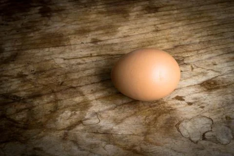 Eggs on wood background Foto stock