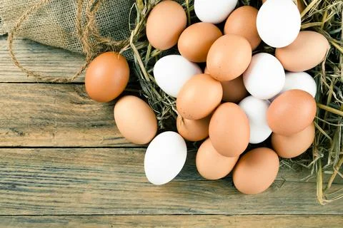 Eggs on wooden background Foto stock