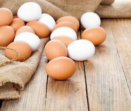 Eggs on wooden background Foto stock