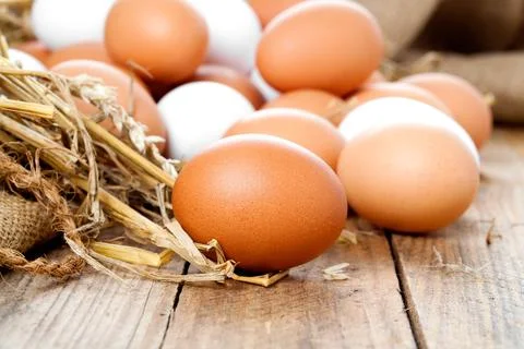 Eggs on wooden background Foto stock