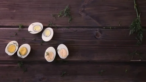 Eggs on Wooden Board Top View Macro Stock-Footage 73629162