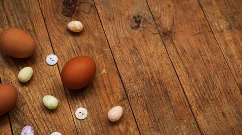 Eggs on a wooden rustic background with copy space for text. Fotos Stock