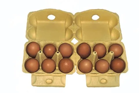 Eggs in yellow packaging Stock Photos