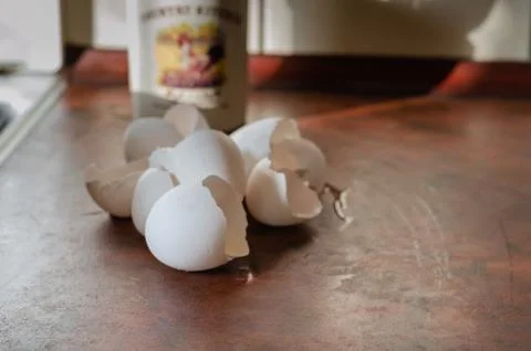Eggshell on the kitchen table during breakfast. Stock Photos