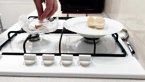 Eggshells Dropped: A Quiet Gesture in One Satisfying Sweep Stock-Footage 315550655