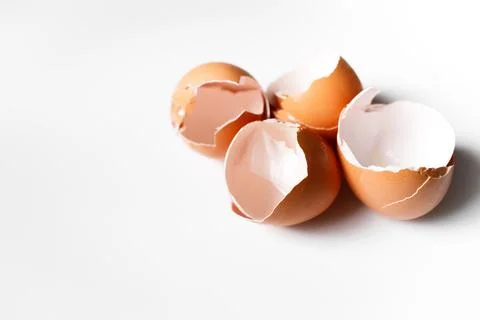 Eggshells on white background Foto stock