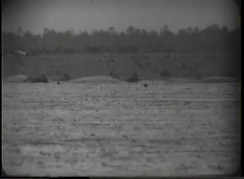 EGLIN FIELD, FLORIDA - 1948: Drop zone — Figures among grounded canopies Video stock 347314532