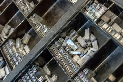Eguipment of Typography workshop. A many old Metallic Letters for Printing. Stock Photos