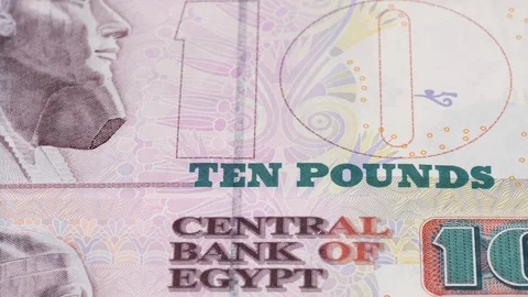 Egypt 10 pound notes tracking. Slider shot. Low angle, macro. 4K Stock Footage 125339108