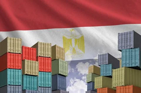 Egypt flag and big stack of shipping cargo containers in docks with sky Stock Photos