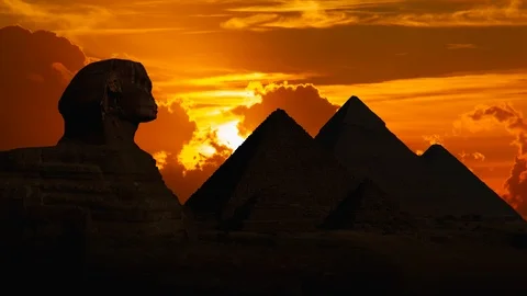 Egypt: The Great Pyramids Of Giza and Sphinx at Sunset, Cairo Stock Footage