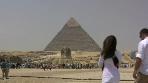Egypt Pyramids approaching the sphinx Stock Footage 690940