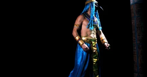 Egyptian deity Thoth with the head of ibis is dancing on black background, 4k Stock Footage 123466391