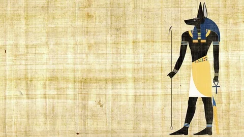 The Egyptian God of Death Anubis on a Papyrus Background 4K Stock Footage