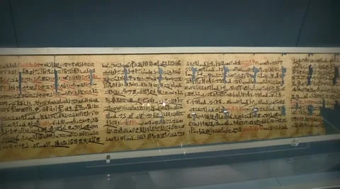 Egyptian papyrus script with hieroglyphics Stock Footage