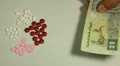 Egyptian Pound EGP, Counting Drugs and Money, Health Care, Colorful Pills HD Footage