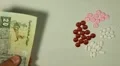 Egyptian Pound EGP, Counting Drugs and Money, Health Care, Colorful Pills HD Footage