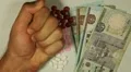 Egyptian Pound EGP, Counting Drugs and Money, Health Care, Colorful Pills HD Footage