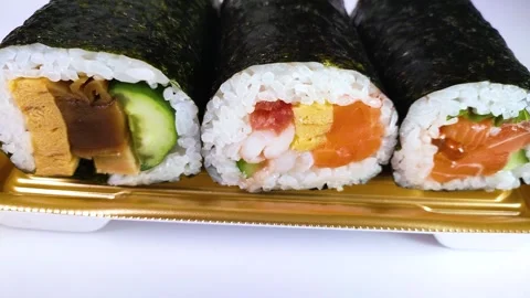 Ehomaki ( Rolled sushi ) close up rotating Stock Footage 324599007