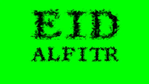 Eid AlFitr smoke text effect green isolated background Stock Footage 139623817