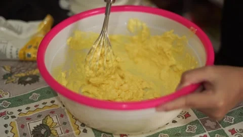 Eid cake dough is prepared in a vessel consisting of a mixture of butter, e.. Stock Footage 271211270