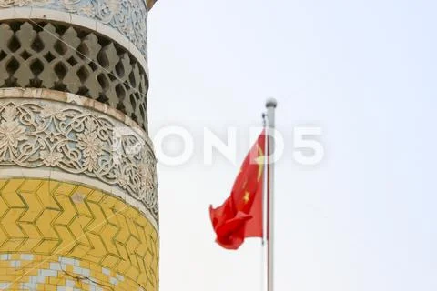 Eidgah mosque minaret with Chinese flag Stock Photos