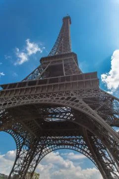 Eifel tower bottom view with cloud sky on background in spring Stock Photos