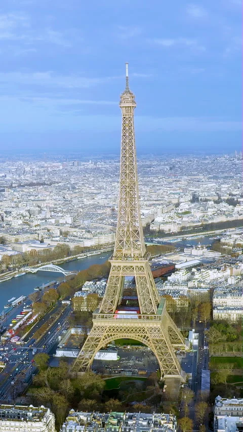 Eiffel Tower aerial orbit shot ft Paris cityscape vertical video in France Stock Footage 318075003