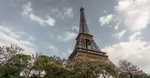 The Eiffel Tower against clouds and sky in Paris, France Stock Photos