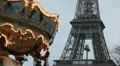 Eiffel Tower and Carousel (merry go round) in Paris, France, French Architecture HD Footage