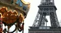 Eiffel Tower and Carousel (merry go round) in Paris, France, French Architecture HD Footage