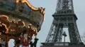 Eiffel Tower and Carousel (merry go round) in Paris, France, French Architecture HD Footage