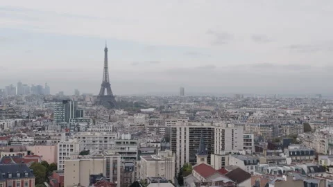 Eiffel Tower and cloudy Paris cityscape, wide scenic view from above Stock Footage 290882221