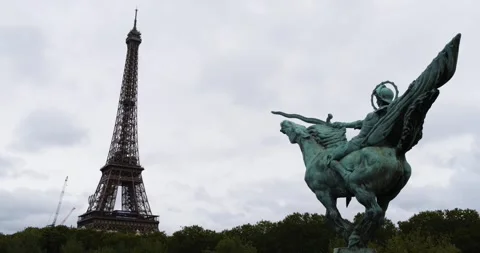Eiffel Tower and The Equestrian statue at Bir-Hakeim Bridge in Paris, France Stock Footage 303652001