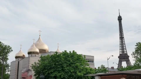 Eiffel Tower and Holy Trinity Cathedral Gold Domes in Paris France Stock Footage 335498395