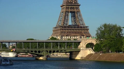 Eiffel Tower and metro bridge in Paris with Seine, France Stock Footage 81159734