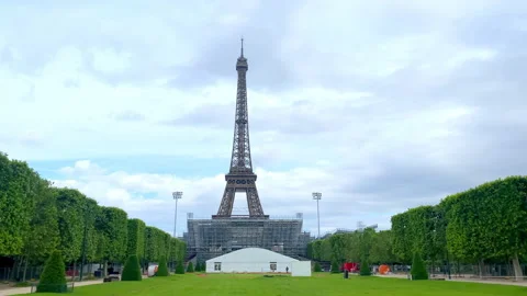 Eiffel Tower and Paris 2024 Olympic Games beach volleyball stadium stands Stock Footage 280036732
