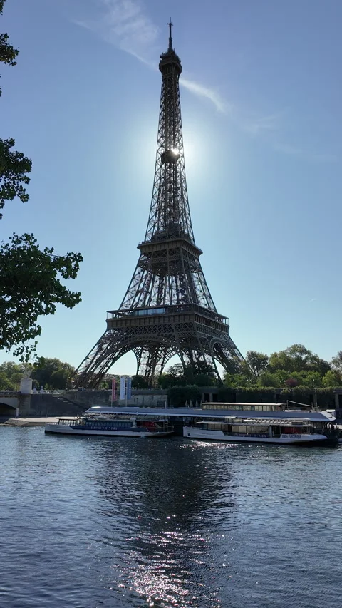 Eiffel tower and the Seine river in Paris one summer morning Stock Footage 316745673