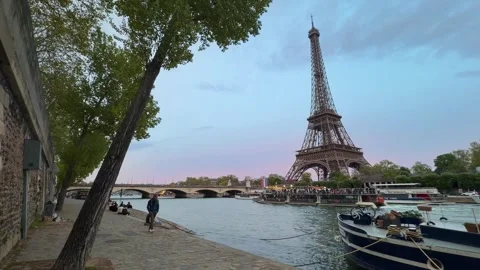 Eiffel Tower and Seine river in Paris at sunset Stock Footage 336008016