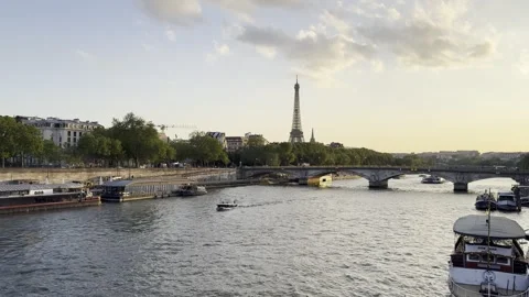 Eiffel Tower and Seine River at sunset in Paris, France Stock Footage 337196633