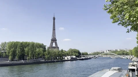 Eiffel Tower and Seine River in Paris, France on a clear spring day Stock Footage 337196660